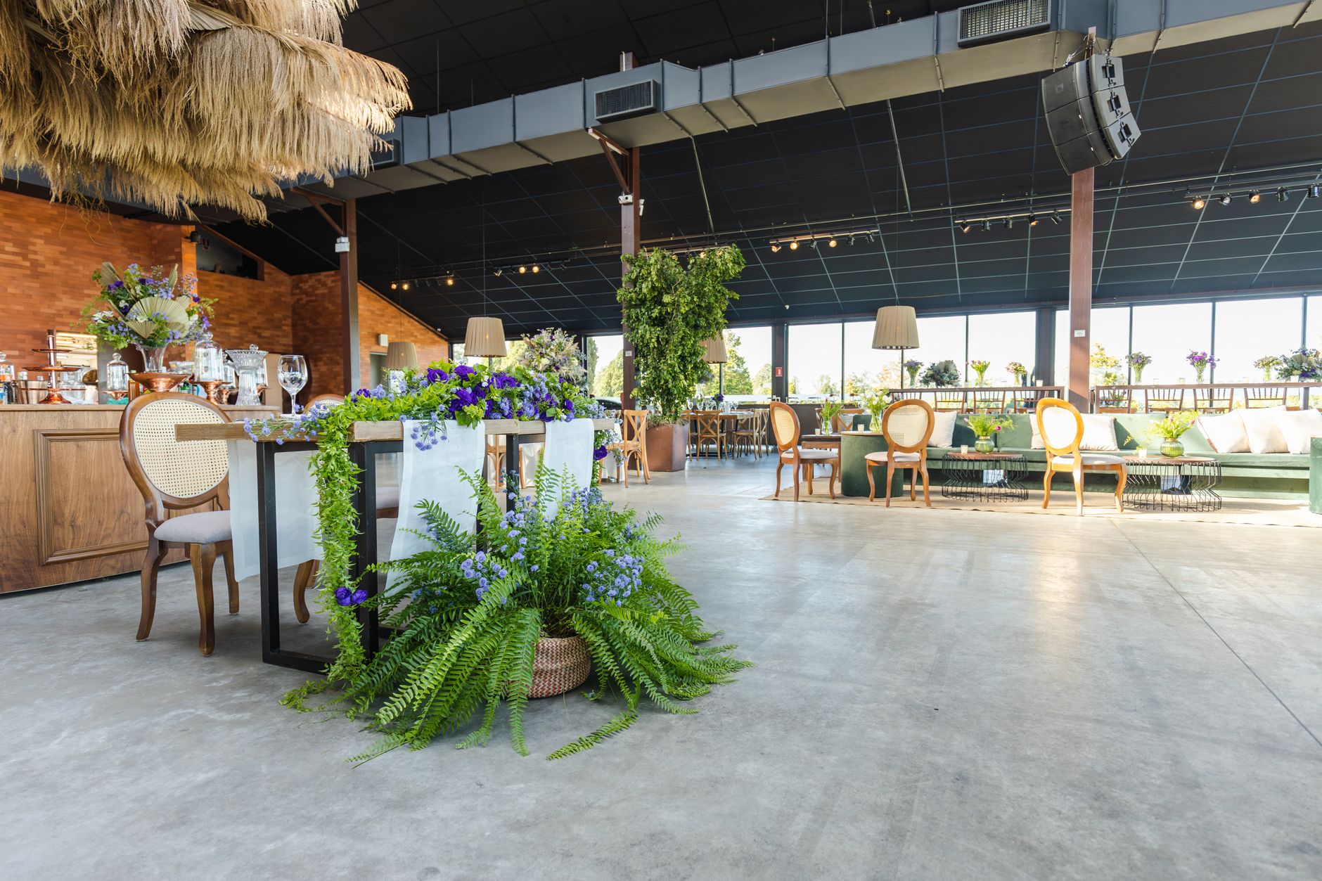 Stylish indoor dining area featuring elegant furniture and lush green plants. — Fc Dordrecht Feyenoord Statistieken