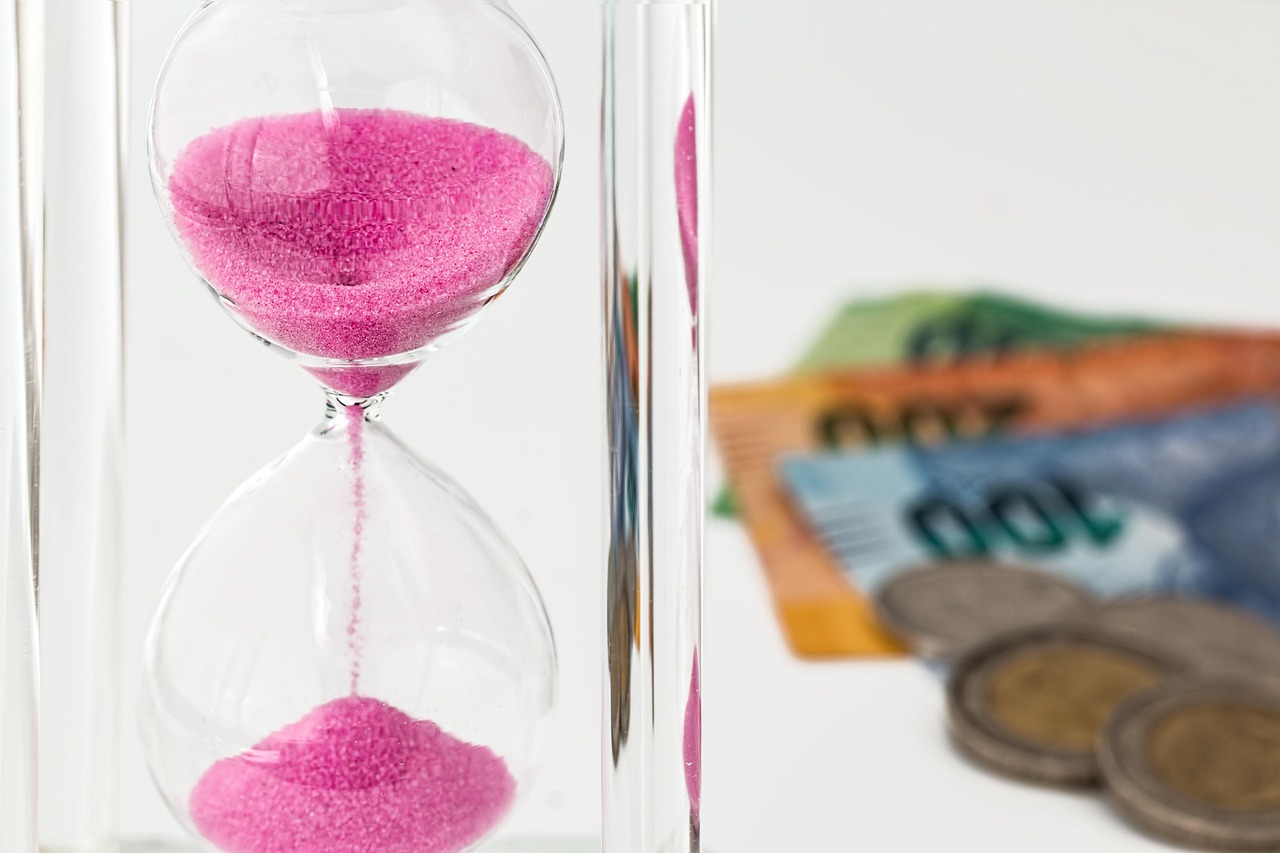 Hourglass, money, time — Get Paid While Everyone Sleeps: Part-Time Jobs at Night