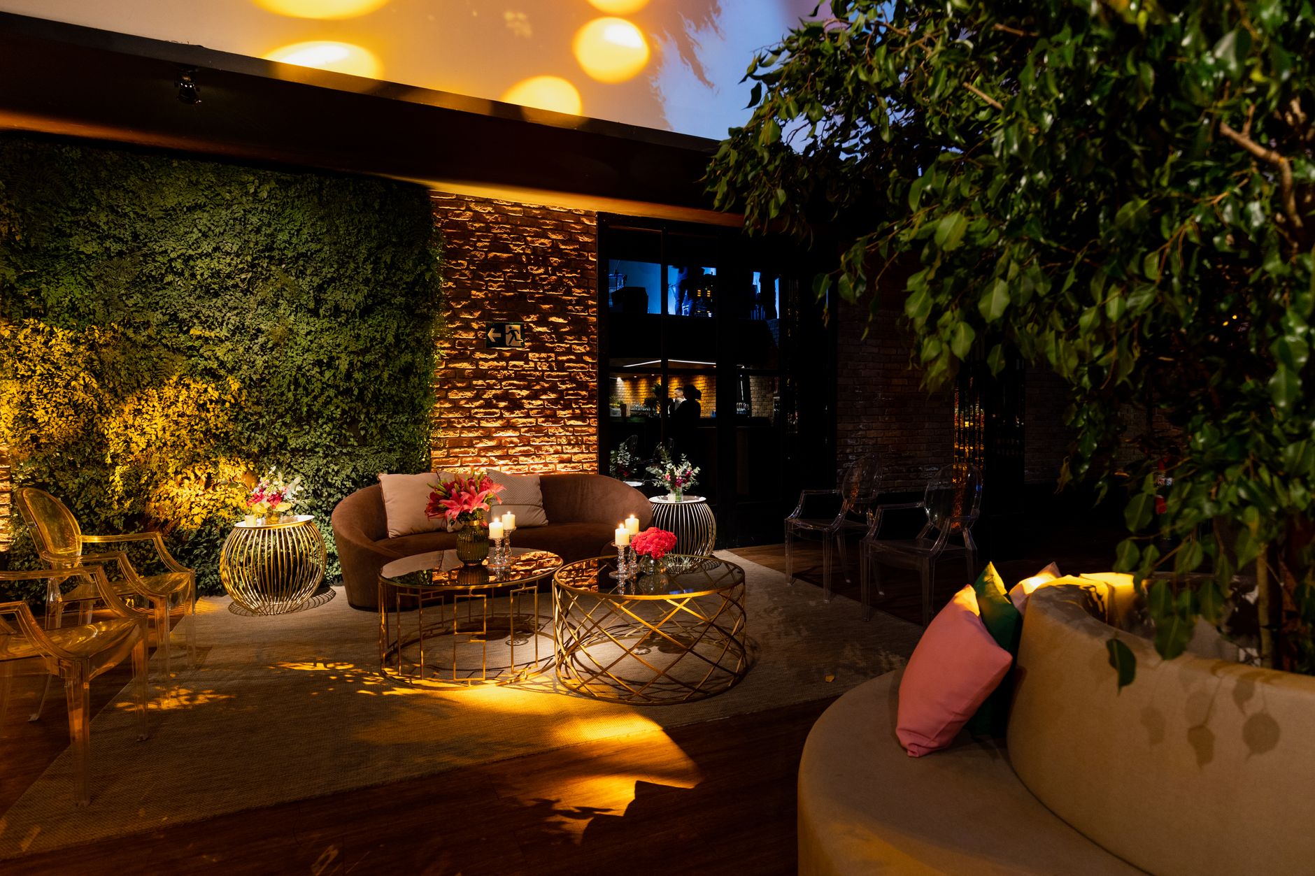 Inviting lounge area with elegant seating and vibrant lighting, perfect for relaxation and socialization. — Scommesse Liverpo