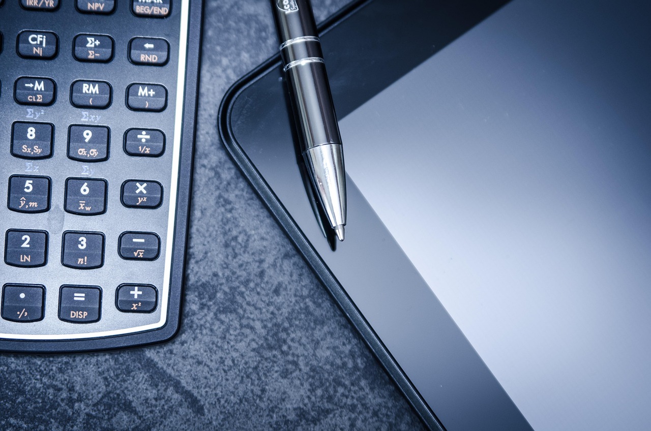 Tablet, calculator, business — Washington DC Web Design Delivering Customized Digital Solutions