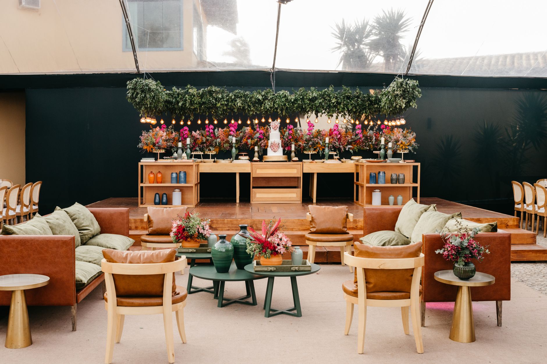 Luxurious indoor event setup featuring elegant seating and vibrant floral arrangements. — Yosports Apuesta Gratis Primera Apu